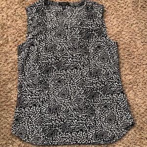 Sleeveless black and white floral top